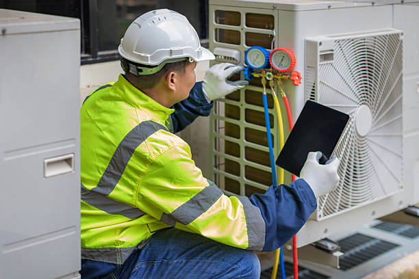 Professional Air Duct Cleaning technician working in Glen Echo, MD